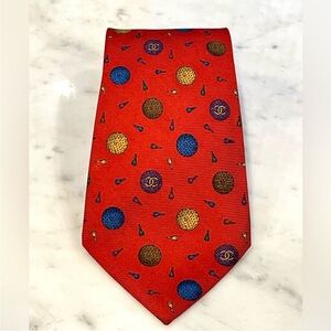 CHANEL silk necktie w/colorful golf balls and tees, CC, red-blue-gold, xx”, EUC